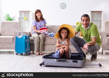 The happy family planning vacation trip. Happy family planning vacation trip