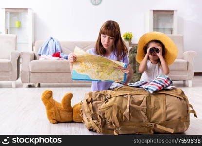 The happy family planning vacation trip. Happy family planning vacation trip