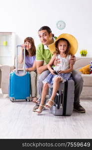 The happy family planning vacation trip. Happy family planning vacation trip