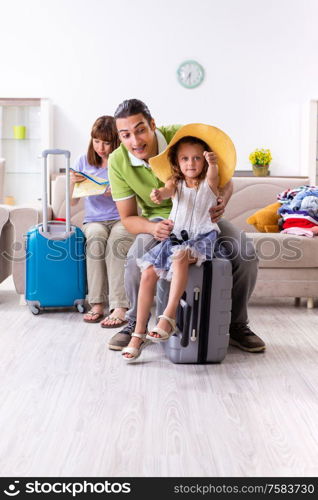 The happy family planning vacation trip. Happy family planning vacation trip