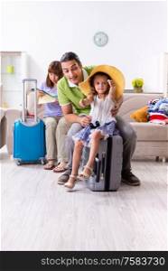 The happy family planning vacation trip. Happy family planning vacation trip