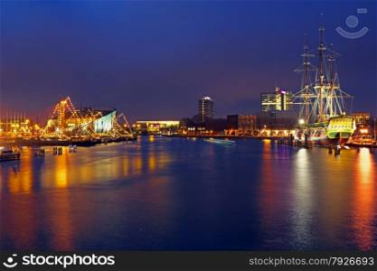 The harbor from Amsterdam in the Netherlands by night at christmas