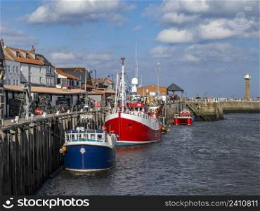 The harbor in the coastal town of Whitby in North Yorkshire on the northeast coast of England.