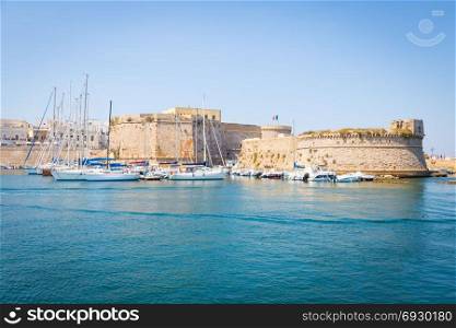The harbour and the old walls of Gallipoli, Puglia Region - South Italy