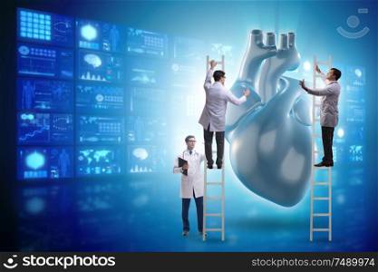The heart examination by a team of doctors. Heart examination by a team of doctors