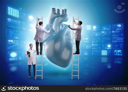 The heart examination by a team of doctors. Heart examination by a team of doctors