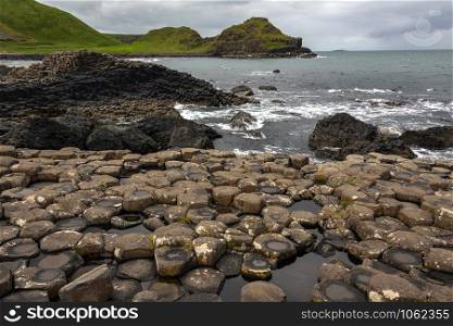 The hexagonal basalt rock formations of the Giants Causeway in County Antrim, Northern Ireland. The site is a UNESCO World Heritage Site.
