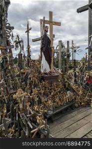 The Hill of Crosses - a site of pilgrimage in northern Lithuania. Over the generations, crosses, crucifixes, statues of the Virgin Mary and thousands of tiny effigies and rosaries have been placed here by Catholic pilgrims.