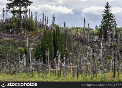 The Hill of Crosses - a site of religious pilgrimage near Siauliai in northern Lithuania. Over the generations, many thousands of crosses, crucifixes, statues of the Virgin Mary, tiny effigies and rosaries have been placed here by Roman Catholic pilgrims from all over the world.