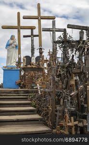 The Hill of Crosses - a site of religious pilgrimage near Siauliai in northern Lithuania. Over the generations, many thousands of crosses, crucifixes, statues of the Virgin Mary, tiny effigies and rosaries have been placed here by Roman Catholic pilgrims from all over the world.