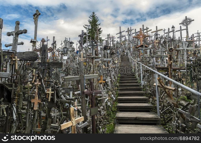 The Hill of Crosses - a site of religious pilgrimage near Siauliai in northern Lithuania. Over the generations, many thousands of crosses, crucifixes, statues of the Virgin Mary, tiny effigies and rosaries have been placed here by Roman Catholic pilgrims from all over the world.