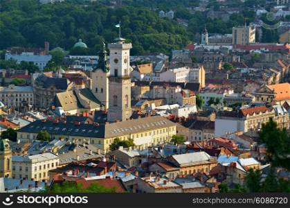 The historic city center of Lviv, old houses in the old town, Tower of City Hall on the Market Square. Lvov, Ukraine