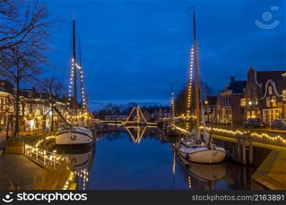 The historical village Dokkum in christmas time in the Netherlands at night