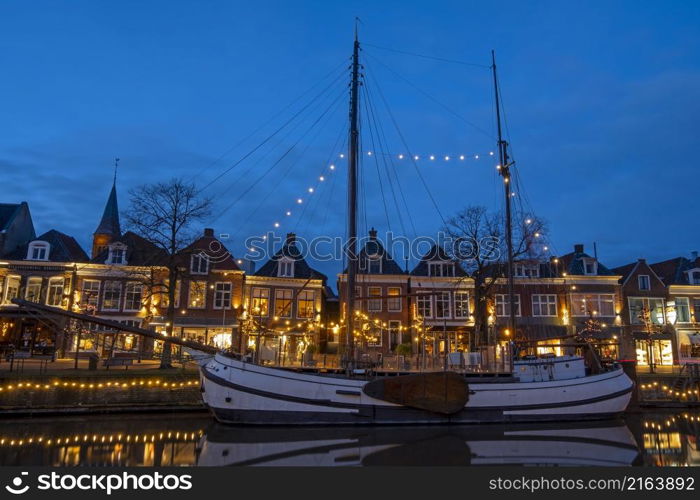 The historical village Dokkum in christmas time in the Netherlands at night