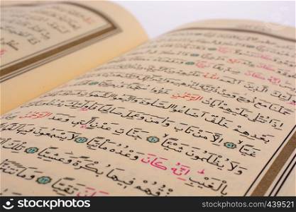 The Holy Quran on a white background