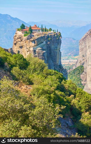 The Holy Trinity monastery on the cliff in Meteora, Greece - Greek landmark