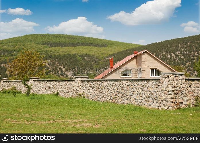 The house in a valley. Crimean mountains and a cottage