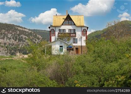 The house in a valley. Crimean mountains and a cottage