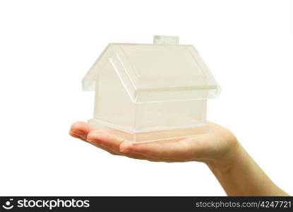The house in human hand on white