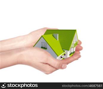The house with colour roof in human hands