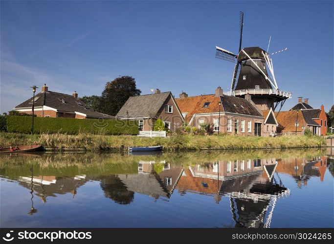 The Hunsingo windmill in Onderdendam. The Hunsingo windmill along the Boterdiep canal in the Dutch village Onderdendam