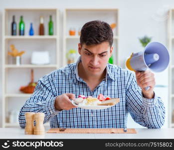 The husband with loudspeaker yelling at his wife. Husband with loudspeaker yelling at his wife