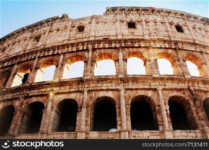 The iconic ancient Colosseum of Rome. View in sunrise .. The iconic ancient Colosseum of Rome