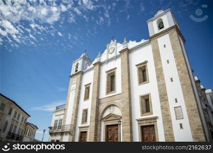 the igreja de Santo Antao at the Parca do Giraldo Square in the old Town of the city Evora in Alentejo in Portugal. Portugal, Evora, October, 2021