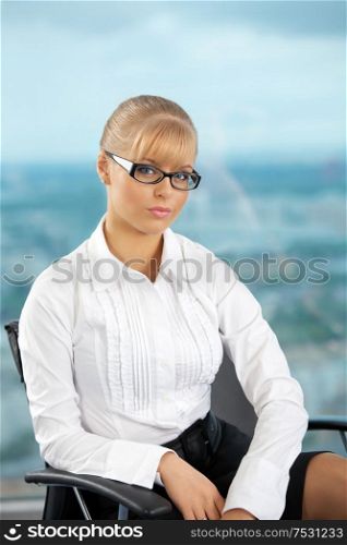 The image of the stylish business woman at office