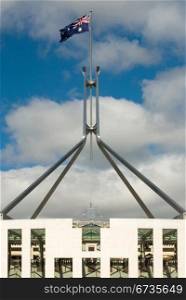 The imposiing structure of the flag pole atop Australia&rsquo;s Parliament House