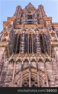 The impressive bell tower of the Notre Dame cathedral from Strasbourg, France. Famous for its architecture and the fact that it's the 6th tallest church in the world
