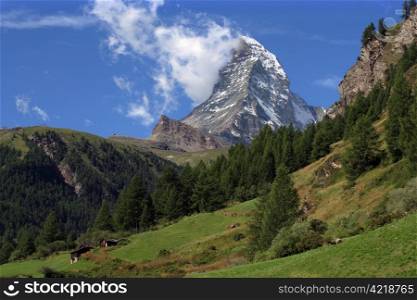 The incredible Matterhorn capturing some clouds in Zermatt Switzerland.