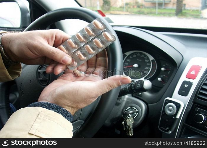 the intake of pills during a car ride.