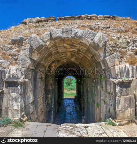 The interior of the Ancient Theatre in the greek city of Miletus, Turkey, on a sunny summer day. The interior of the Miletus Ancient Theatre in Turkey