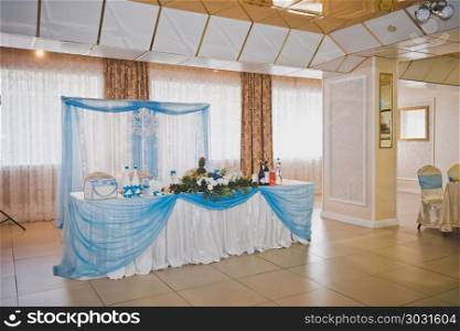 The interior of the Banquet hall for weddings.. The Banquet hall for weddings is decorated in bluish tones 728.. The Banquet hall for weddings is decorated in bluish tones 728.