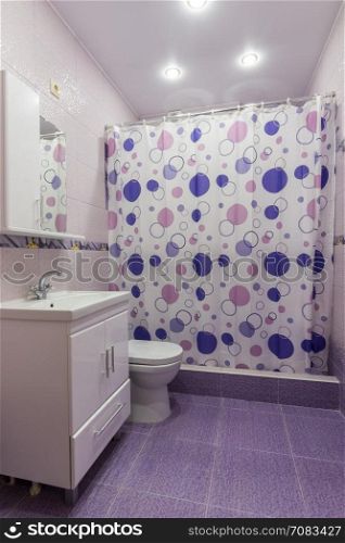 The interior of the bathroom, room with dressing room, shower curtain curtained