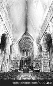 The Interior of the Cathedral in St Hubert, Belgium. Saint Hubrt&rsquo;s Church art and structure inside the church. Black and White Picture