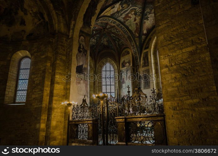 The interiors of Saint George Basilica in Prague: ancient frescos on ceilings