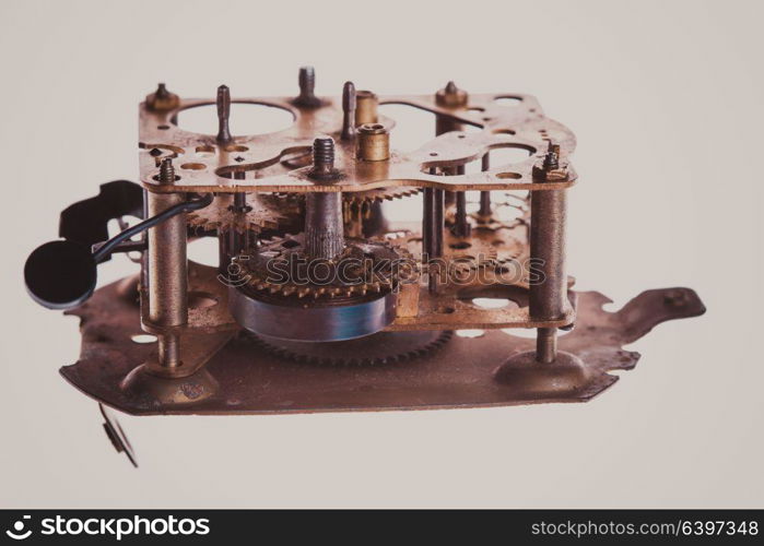 The internal design of the mechanical and rusty clock in a larger view. Vintage clock mechanism