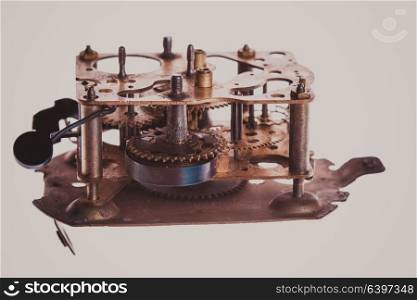 The internal design of the mechanical and rusty clock in a larger view. Vintage clock mechanism