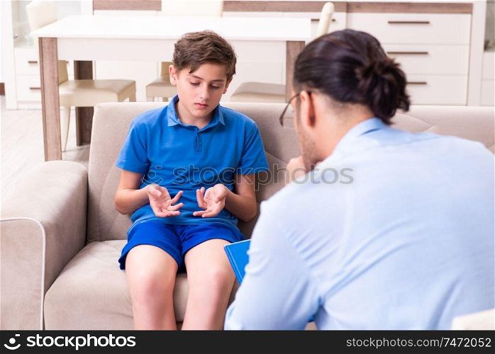 The internet addicted boy visiting male doctor . Internet addicted boy visiting male doctor 