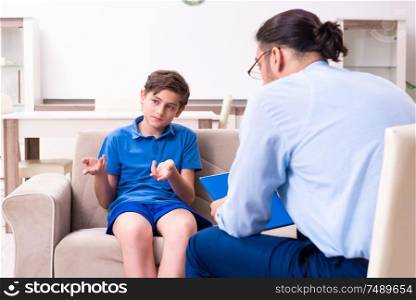 The internet addicted boy visiting male doctor . Internet addicted boy visiting male doctor