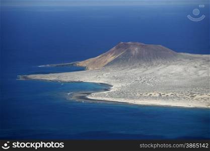 The Isla Graciosa from the Mirador del Rio viewpoint on the Island of Lanzarote on the Canary Islands of Spain in the Atlantic Ocean. on the Island of Lanzarote on the Canary Islands of Spain in the Atlantic Ocean.&#xA;