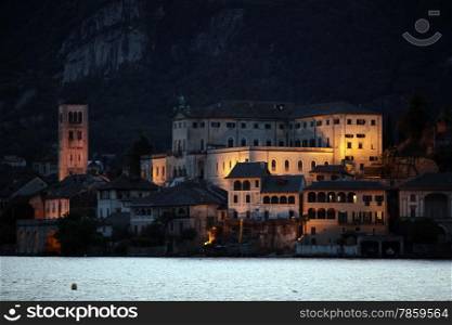 The Isla San Giulio in the Ortasee outside of the Fishingvillage of Orta on the Lake Orta in the Lombardia in north Italy. . EUROPE ITALY LOMBARDIA