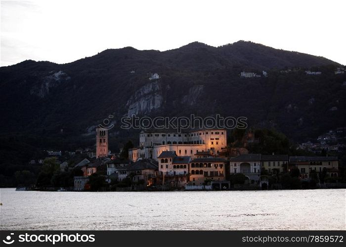 The Isla San Giulio in the Ortasee outside of the Fishingvillage of Orta on the Lake Orta in the Lombardia in north Italy. . EUROPE ITALY LOMBARDIA