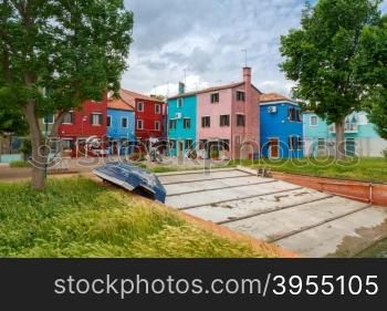 The island in the lagoon near Venice. Famous tourist attraction. Famous for its colorful houses and lace.. The island of Burano. Italy.