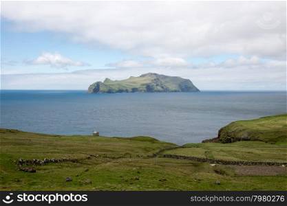 The island Mykines on the Faroe Islands. The island Mykines on the Faroe Islands as seen from Gasadalur