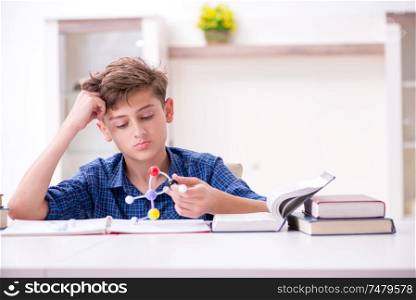 The kid preparing for school at home . Kid preparing for school at home
