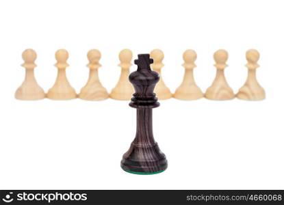 The king against pawns. Wooden chess piece on chessboard