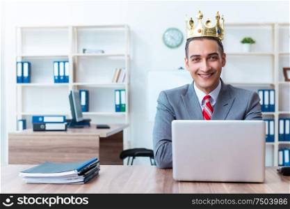 The king businessman at his workplace. King businessman at his workplace